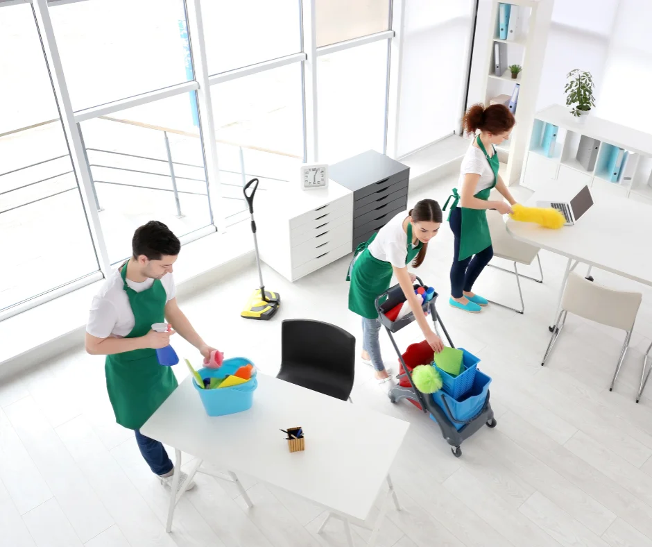 Jiffy Elite Maids team delivering expert office cleaning services in Davie, Florida, using eco-friendly supplies in a modern workspace.