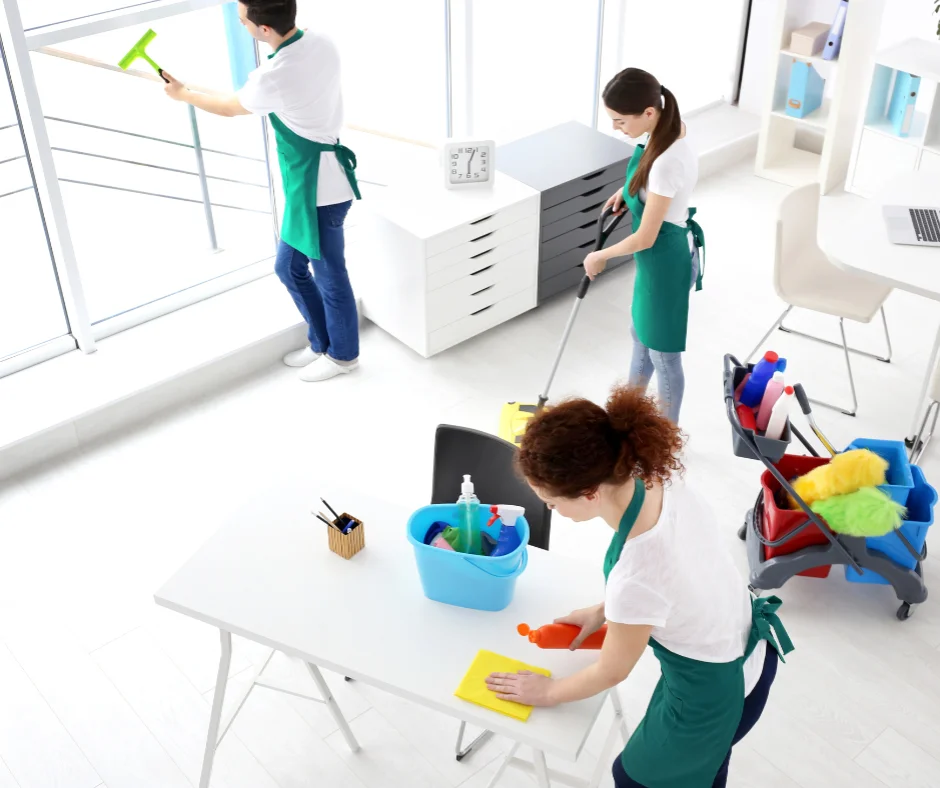 Jiffy Elite Maids team performing residential cleaning in Hollywood, Florida—sanitizing windows, mopping floors, and wiping surfaces with eco-friendly products.